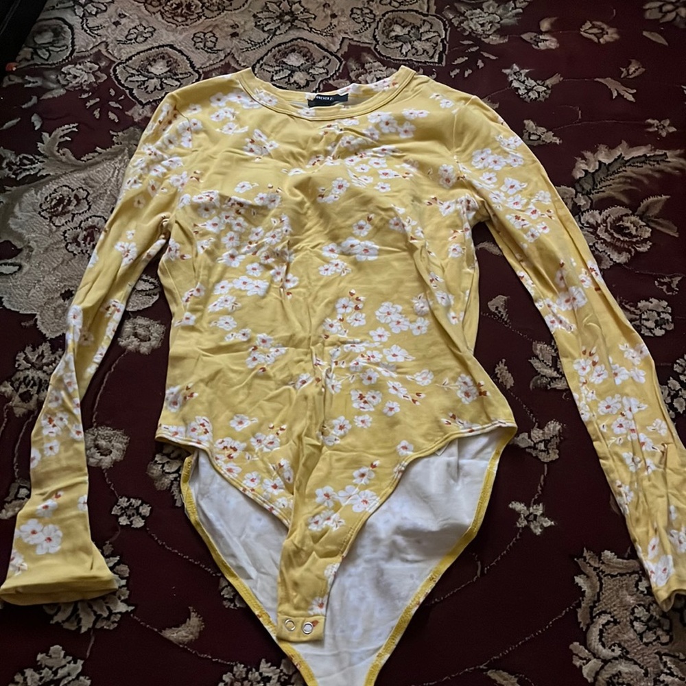 Floral bodysuit from forever 21 in a size L. Has been worn twice, good condition